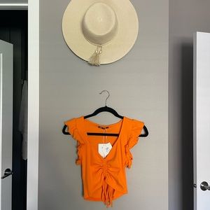 Orange ruffled cut sleeve Zara shirt